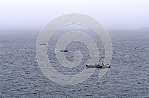 Readying the boats in the Fog