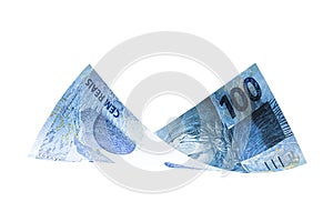 100 reais banknotes falling, one hundred reais banknote from brazil on isolated white background photo