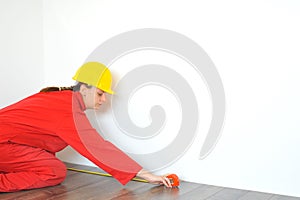 Real architect taking measures while planing house renovation