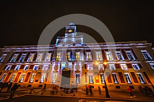Real Casa de Correo building in Puerta del Sol at night photo