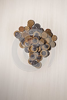 Real currency, money from Brazil. Real coins forming the map of Brazil. photo