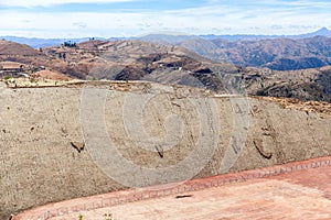 Real dinosaur footprint imprinted in the rock. Side view. Nacional Park in Sucre, Bolivia