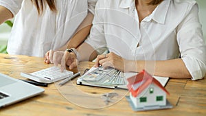 A real estate agent calculates the buyer`s down payment