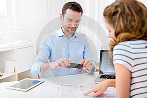 Real estate agent and customer at the office