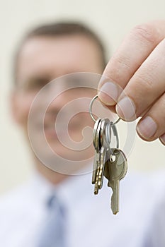 Real-estate agent handing over keys