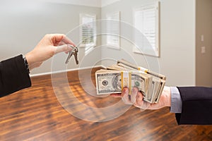 Real Estate Agent Hands Over New House Keys For Cash Inside Empty Room