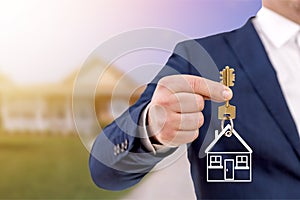 Real estate agent holding keys