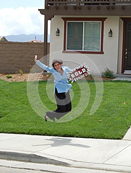 Real Estate Agent Jumping -Sold Home! photo