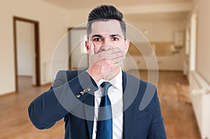 Real estate agent looking perplexed