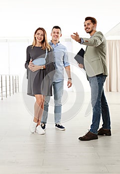 Real estate agent showing new apartment