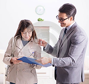 Real estate agent showing new apartment property to client