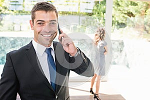 Real-estate agent talking on the mobile phone