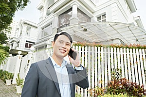 Real estate agent talking on the phone