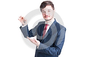 Real estate agent wearing suit showing keying