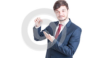 Real estate agent wearing suit showing keying