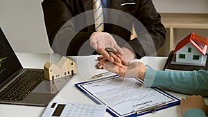 Real estate agents talk to customers on leases. Or buy a home with home loan offers and home insurance with rent.