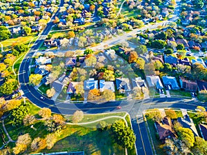 Real Estate Back of Community with Colorful Leaves turning colors for Fall Autumn Texas Hill Country Neighborhood Suburb Home