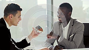 Real-estate black agent with man signing contract in modern white european office