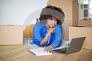 Real Estate. Black Woman Searching Flat Online With Laptop
