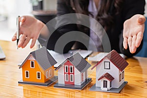 Real estate brokers are offering homes for customers to purchase within their sales offices and can also suggest financing so they