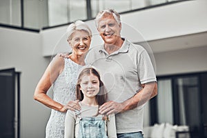 Real estate, family home and portrait of girl with grandparents in new house, apartment and residence. Retirement, smile