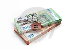 Real estate investing concept. Euro bills. Keys close-up