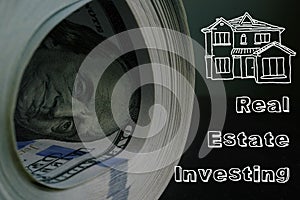 Real Estate Investing is shown on the conceptual business photo