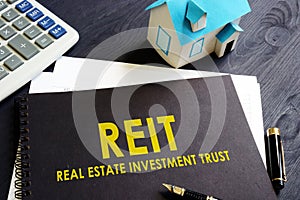 Real estate investment trust REIT on a desk. photo