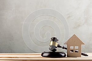 Real estate sale auction concept - gavel and house model