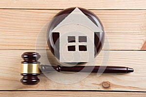 Real estate sale auction concept - gavel and house model