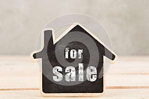 real estate sale concept - little house model