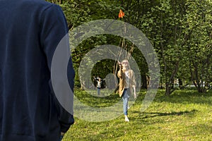 Real Family Have Fun, Playing Game In Meadow, Happy Smiling Boy Run on Background. Summer