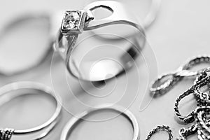 Real gold rings with diamonds, gems close up macro shot