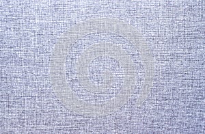 Real gray synthetic fiber fabric with a textured background. Fabric textile background.