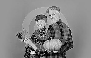 Real happiness. Harvest time concept. happy family of farmers. man and woman retro peaked hat. vintage couple hold