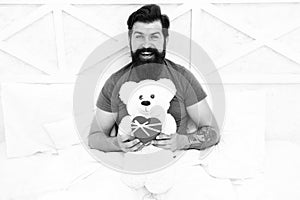 Real happiness. Love and happiness. bearded man teddy bear in bed. Gift box for holidays. nice present for you