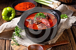 real Hungarian goulash with beef and paprika photo