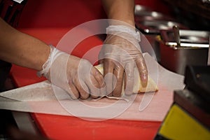 Real kitchen of fast food restaurant and the chef who cooking a doner kebab