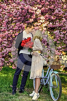 Real love. romantic season. dog in vintage bike. Love and friendship. couple in love under tree valentines day