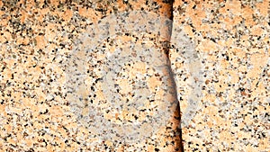 Real natural brown granite pattern, polished mineral slice. Seamless cracked marble damaged concrete texture. Architectural