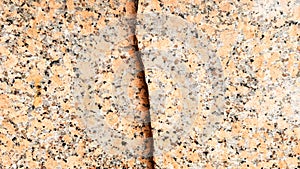 Real natural brown granite pattern, polished mineral slice. Seamless cracked marble damaged concrete texture. Architectural