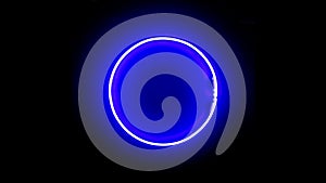 Real neon circle. Blue neon ring on black background. Neon background.