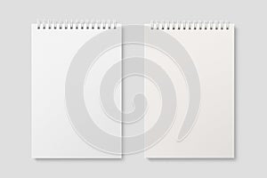 Real photo, blank spiral bound notepad mockup template, isolated on light grey background.