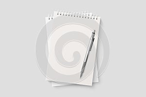 Real photo, blank spiral bound notepad mockup template, isolated on light grey background.