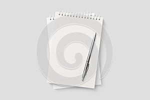 Real photo, blank spiral bound notepad mockup template, isolated on light grey background.