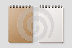 Real photo, blank spiral bound notepad mockup template with Kraft Paper cover, isolated on light grey background.