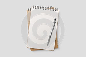 Real photo, blank spiral bound notepad mockup template with Kraft Paper cover, isolated on light grey background.