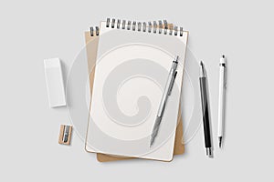 Real photo, blank spiral bound notepad mockup template with Kraft Paper cover, isolated on light grey background.