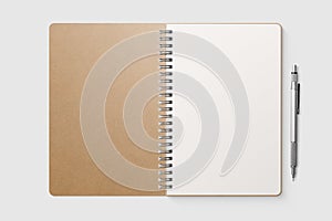 Real photo, blank spiral bound notepad mockup template with Kraft Paper cover, isolated on light grey background.