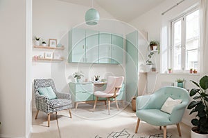 Real photo of a spacious, pastel office interior with mint cupboard standing against white wall with copy space next to an armchai